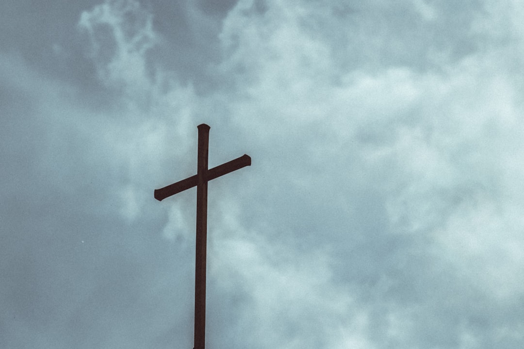 Offerings brown-wooden-cross-under-cloudy-sky-during-daytime-kyajkws-300